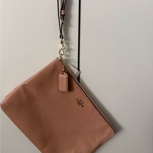 Coach Tan Leather Wristlet Clutch with Minimalist Design